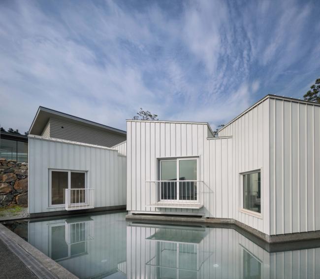 BIM建筑|碧湖之畔,丛林之间:飘浮立方体室第 / Younghan Chung Architects BIM建筑|碧湖之畔,丛林之间:飘浮立方体室第 / Younghan Chung Architects