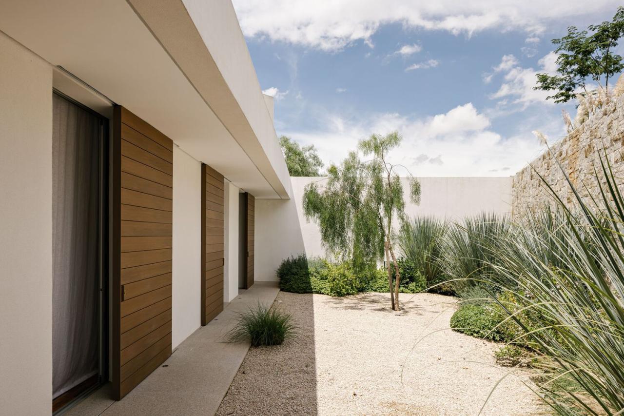 借地势嵌入地下打造庭院核心自然延伸的度假屋设计 借地势嵌入地下打造庭院核心自然延伸的度假屋设计